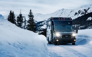 RV in snow and travelling through winter 